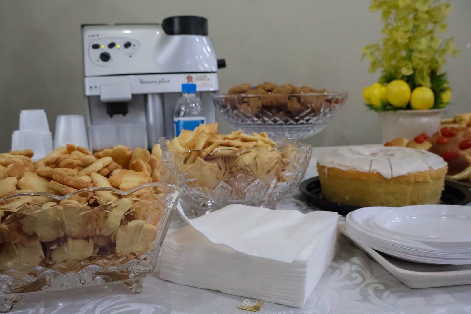 Mesa de café e recepção do evento Re.conectar
